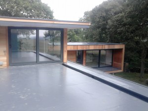 Here, the use of a very low profile mounting system has allowed solar PV to discretely blend into the background in this striking example of modern architecture. Using this low profile enabled the weight on the roof to be reduced significantly over traditional ballast systems. The roof covering was left un-penetrated and intact and with a lower rake the system produces a more consistent output.